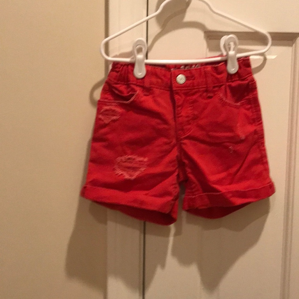 Girls size 8 distressed red denim short